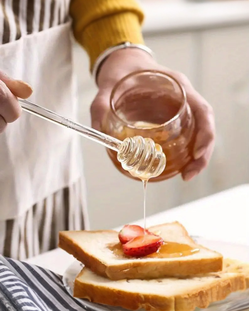 Image of premium, glass Honey dipper from Honey Wholesale, a Western Australian online honey shop in Perth, offering worldwide shipping